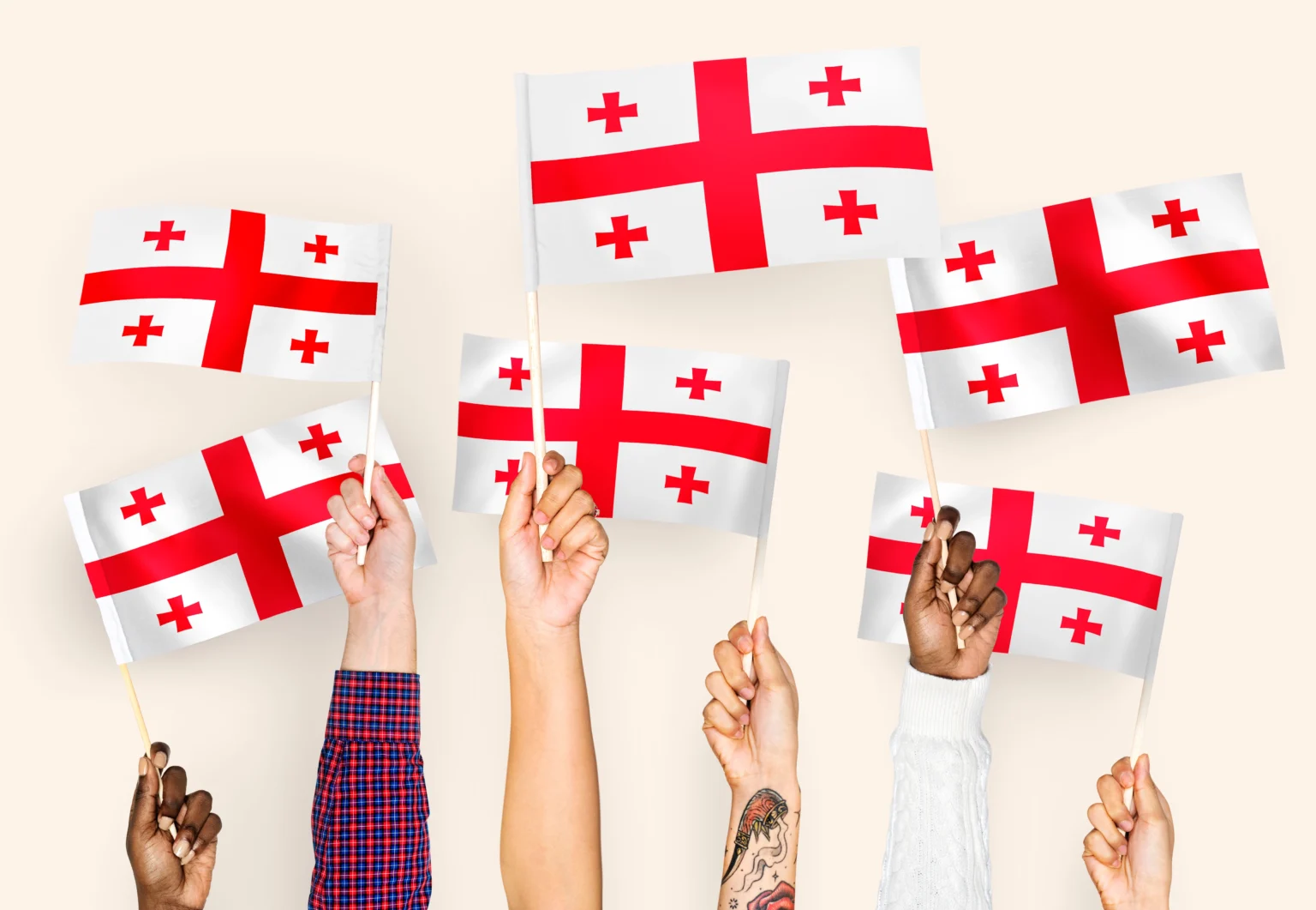hands-waving-flags-georgia-1536x1061 (1).webp